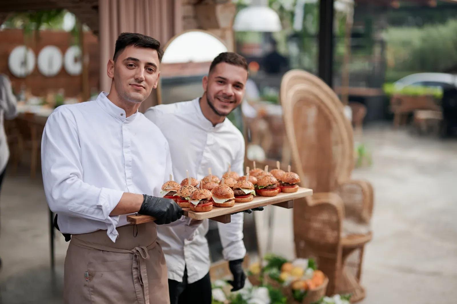 Mini burgers on wooden board